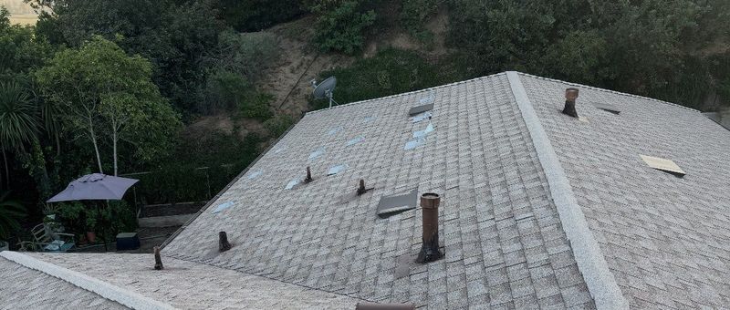 Completed architectural shingle roof at sunset — a real NRG Roofing job in Ventura County