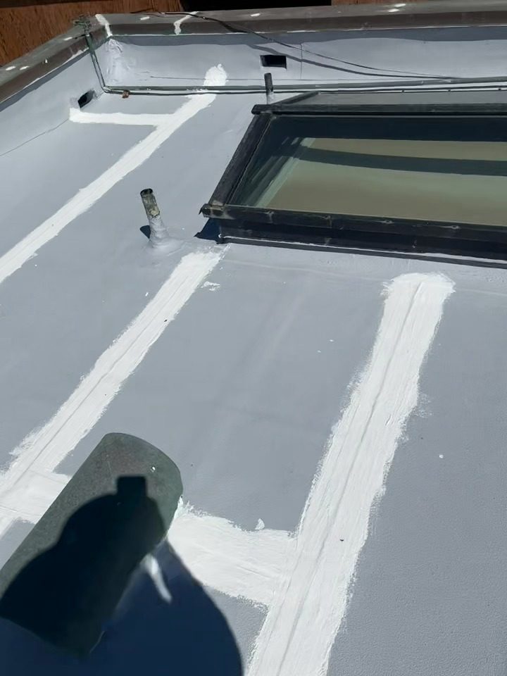 Three-course seam reinforcement at a roof vent before silicone coating, Malibu flat roof, NRG Roofing