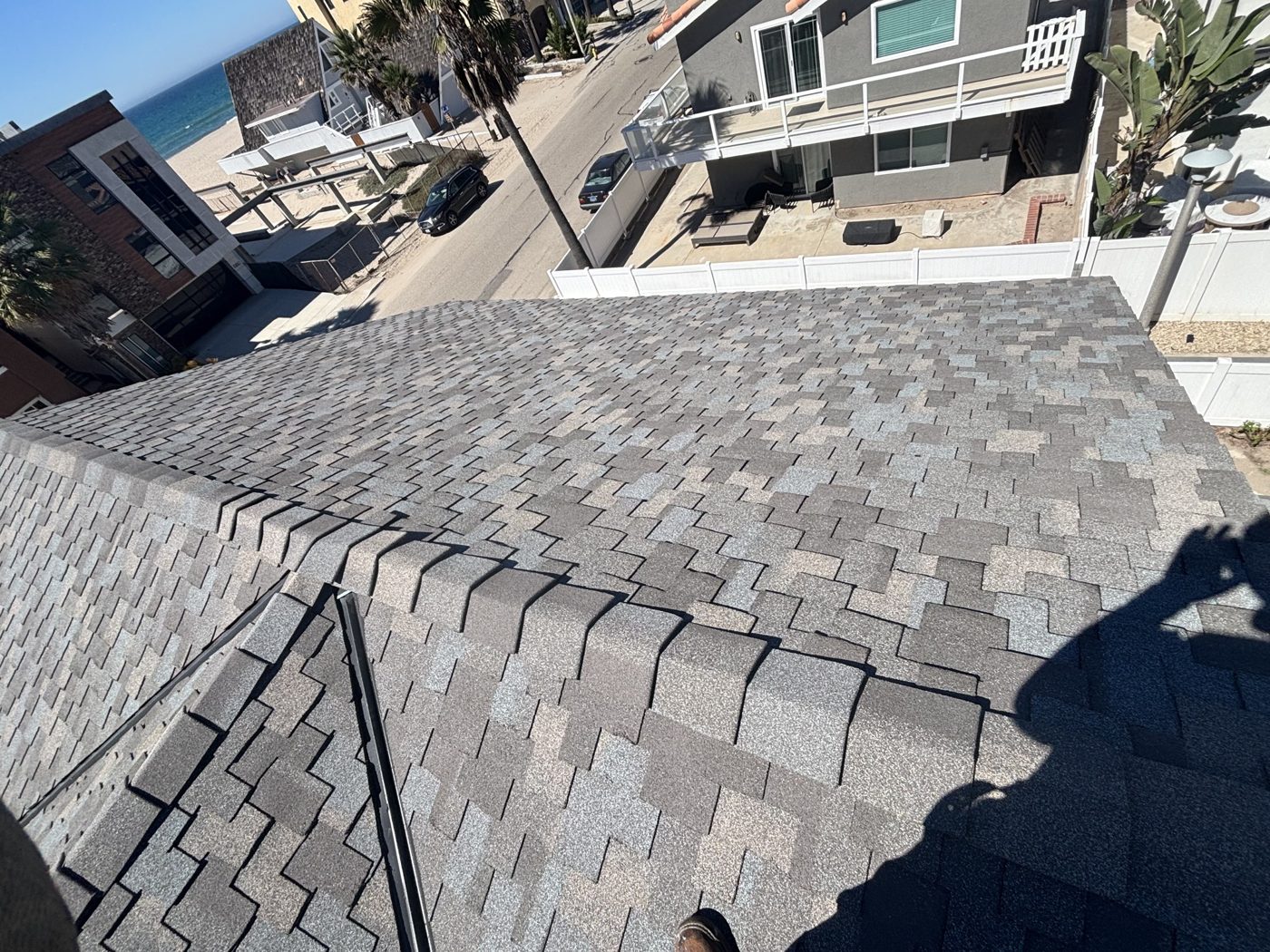 Completed CertainTeed Landmark Solaris re-roof in Country Gray at the gable of an Oxnard beach home by NRG Roofing