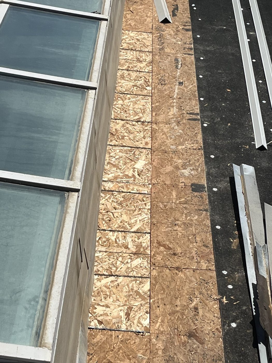 Rotted decking replaced with new OSB before underlayment, Oxnard, NRG Roofing
