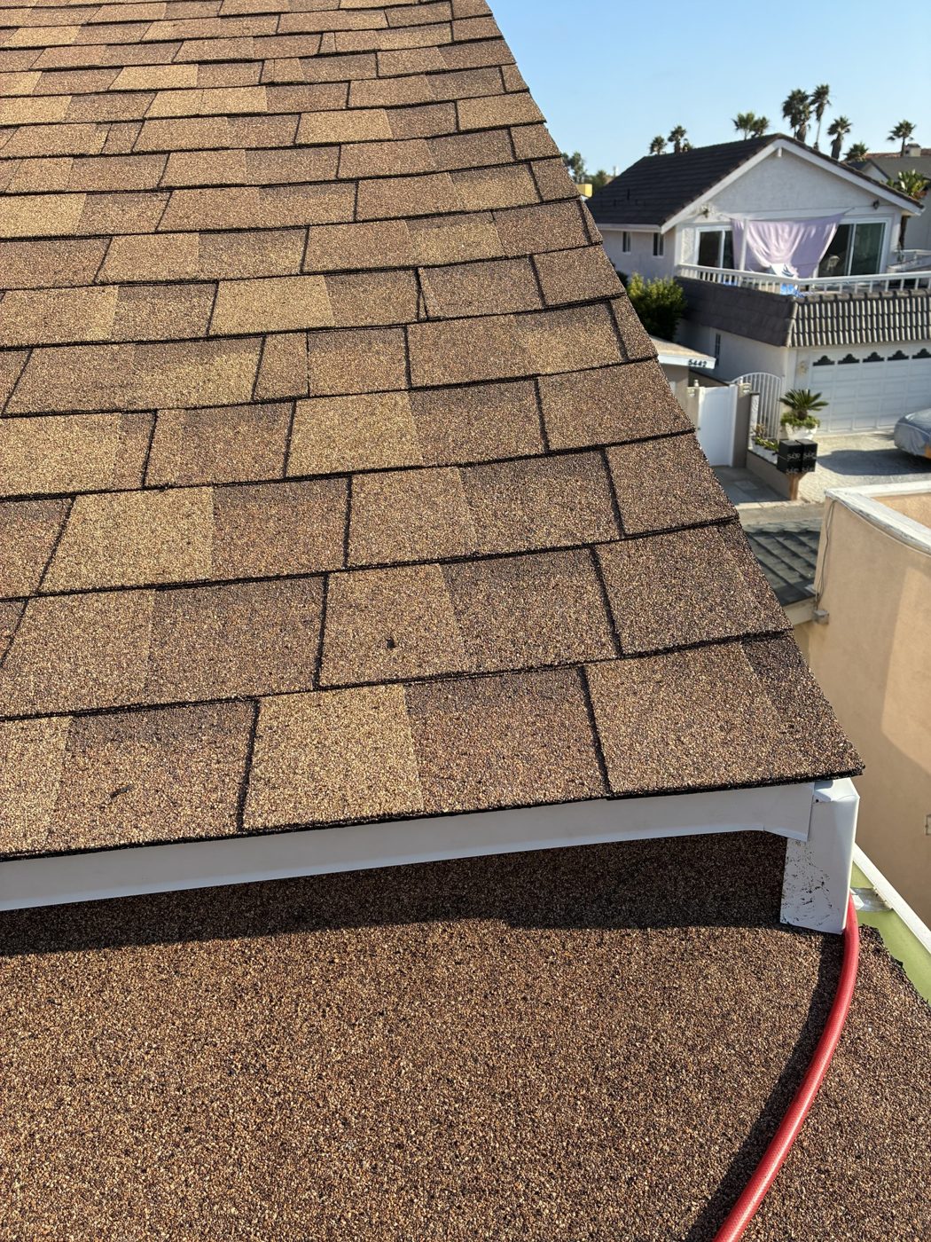 Finished architectural shingle eave over the torch-down section, Oxnard, by NRG Roofing