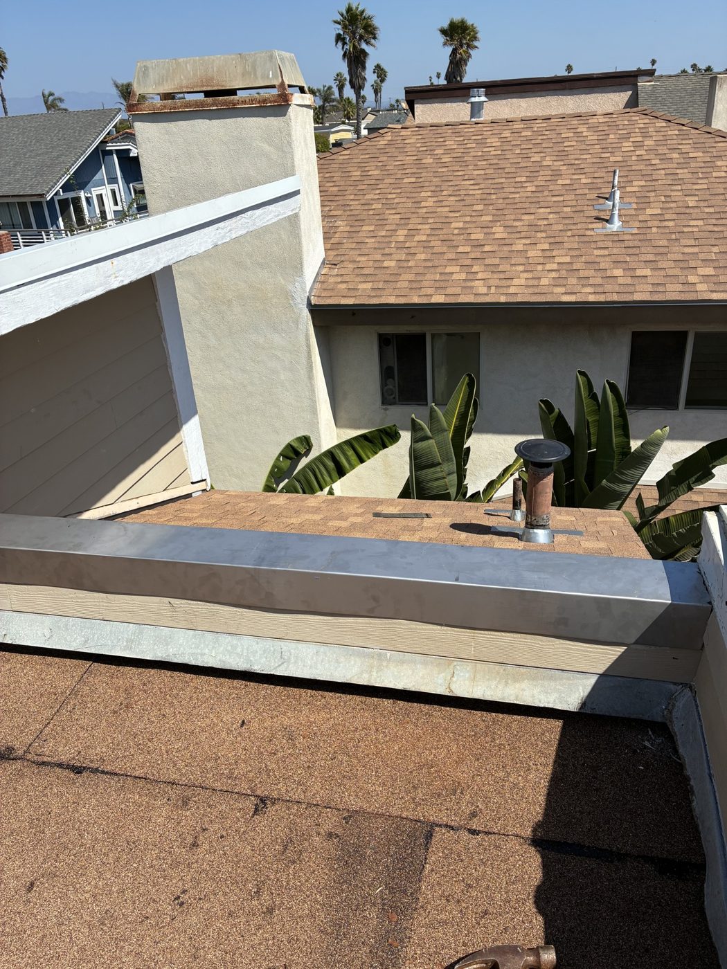 New parapet wall cap installed over a torch-down flat section, Oxnard, by NRG Roofing