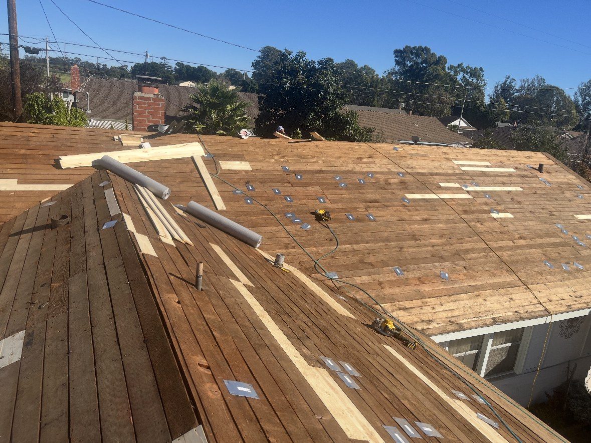 Roof deck wood repairs during a tear-off by NRG Roofing in Ventura County