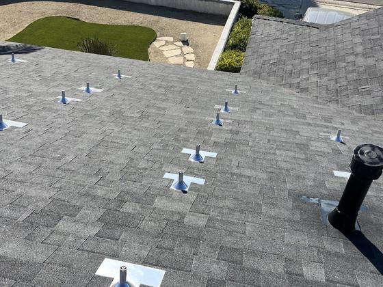Charcoal asphalt shingle roof with new pipe flashings in Ventura County