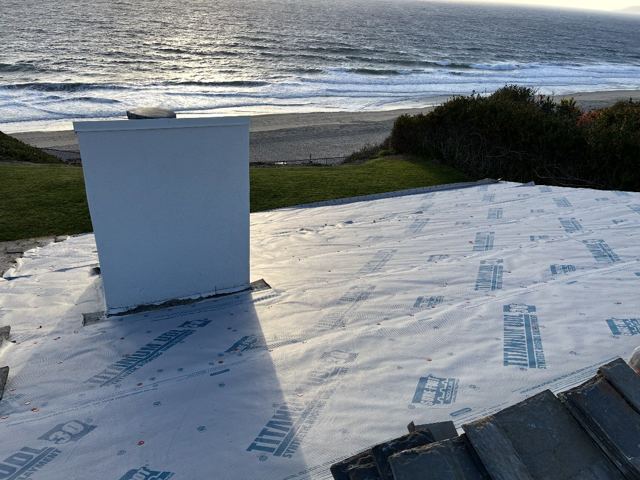 Synthetic roofing underlayment on an oceanfront home by NRG Roofing in Ventura County